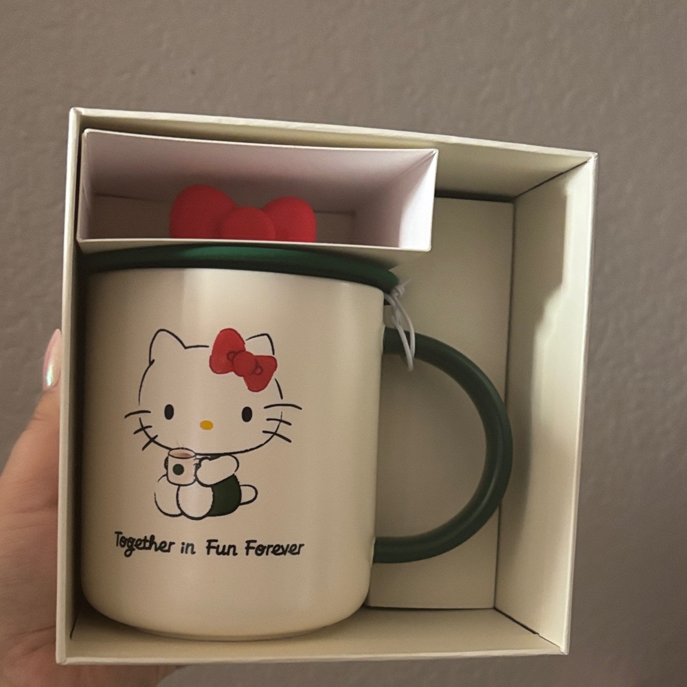 Starbucks Cream Mug and comes with Box with Hello Kitty Design